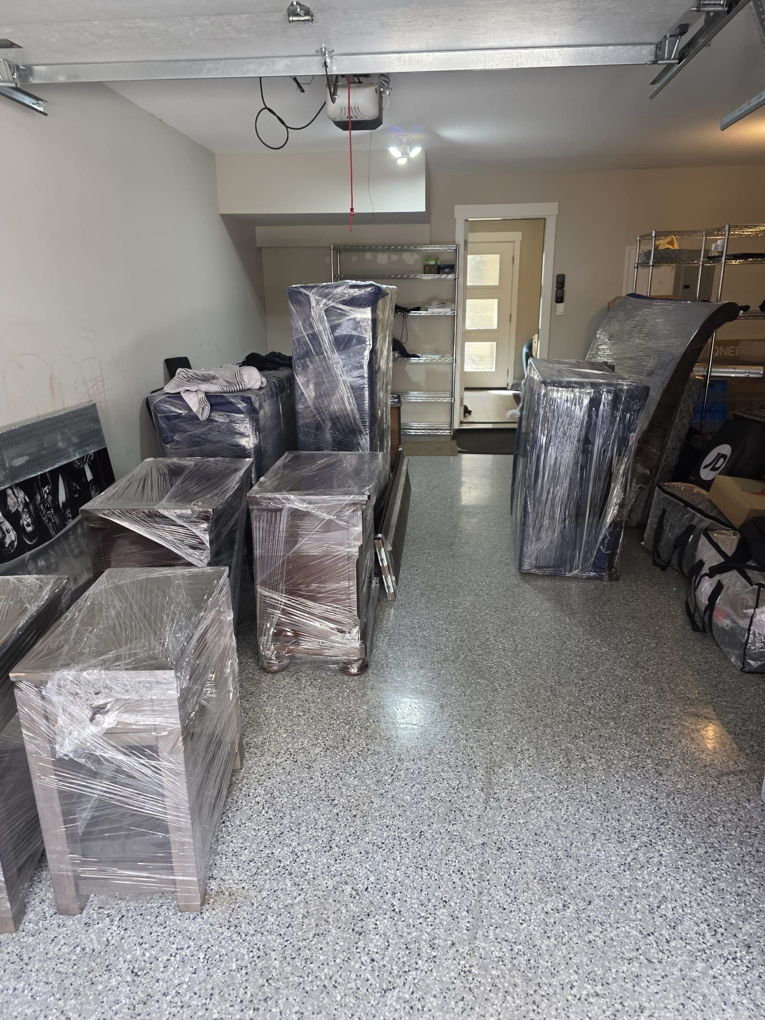 Carefully wrapped furniture staged for a Richmond move