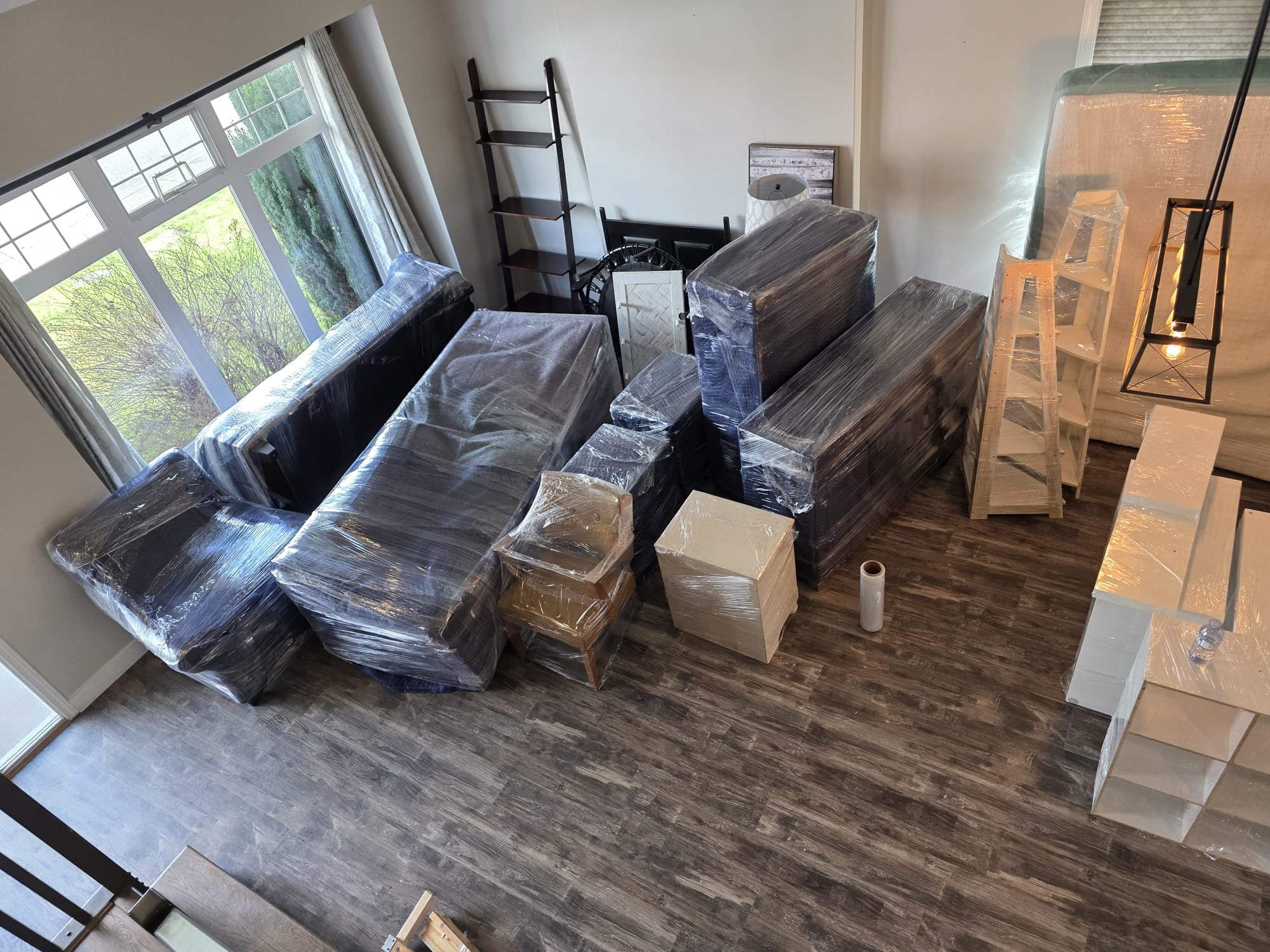 Carefully wrapped household goods staged for a Metro Vancouver move